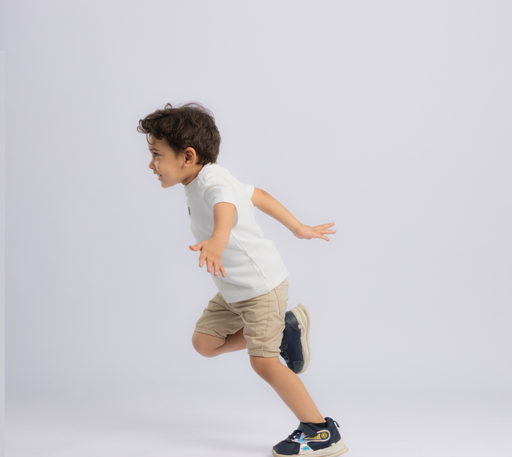 3years old boy running side view