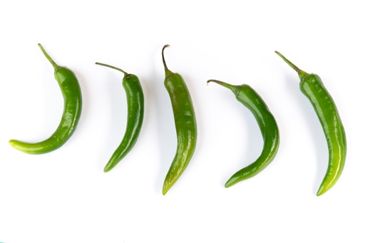 green hot chilli pepper on white background