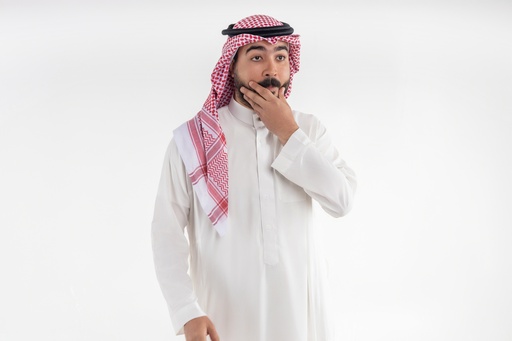 Khaliji man astonished with his hands on his chin