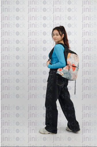 Girl wearing a backpack - close-up side shot - stock image