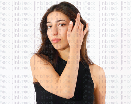 Isolated female model playing with her hair high quality stock image