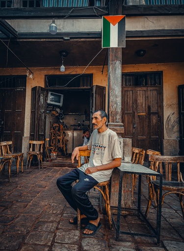 Egyptian man sitting on traditional Egyptian coffee shop