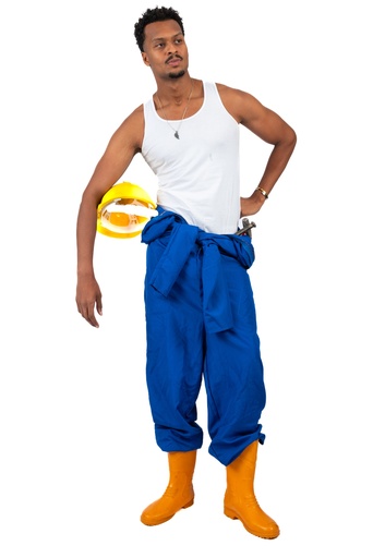 Egyptian worker in blue uniform and holding his yellow hat in his arm