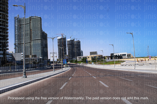 high way road with high glass buildings at the background in alamein