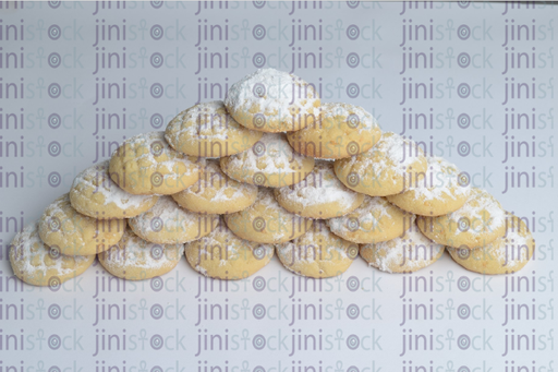 pyramid of kahk with sugar - stock image