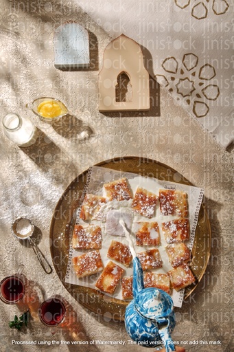 In a Ramadan setup feteer with powder sugar and milk