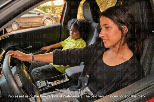 mother and daughter in the car