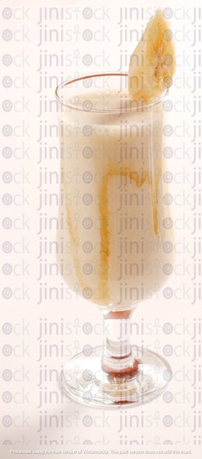 Banana juice with milk  in an elegant glass cup