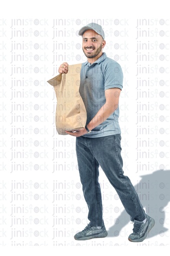 A delivery man holding a sack and walking