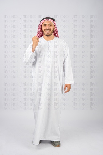 Khaliji,Saudi or Emirati or a Gulf man doing the winner sign