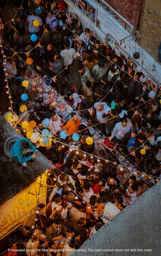 building roof with people celebrating ramadan