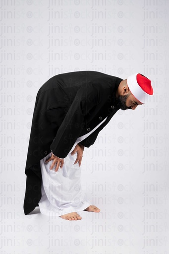 a sheikh prays