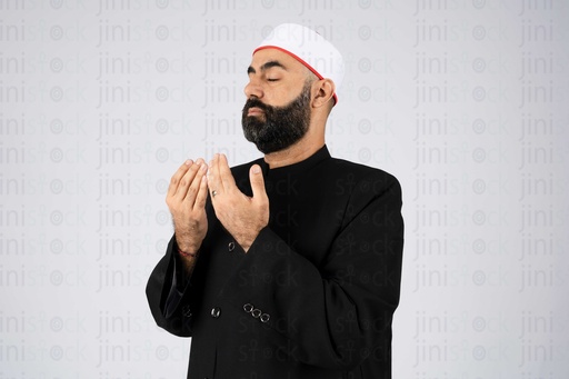 portrait for a Muslim sheikh praying with doaa