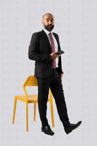 Business man leaning on a chair will standing with confideness