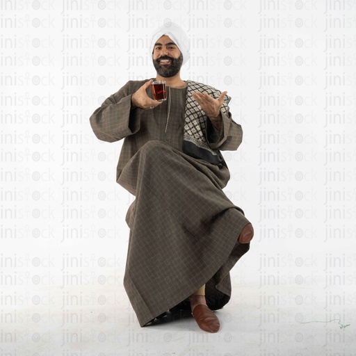 man from upper egypt sitting drinking tea