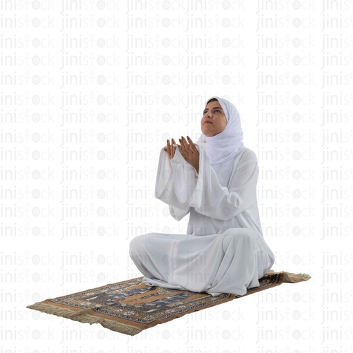 muslim woman in white praying