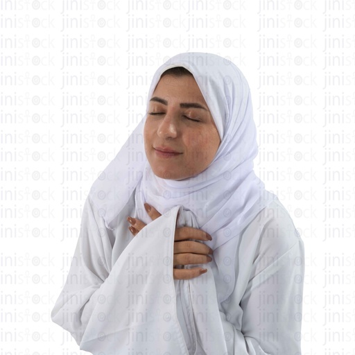 woman in white praying with closed eyes