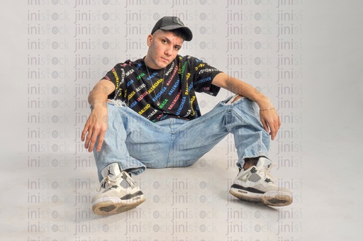 Young Egyptian man sitting on the floor