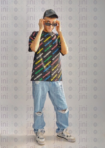 a cool young man wearing sunglasses and a cap