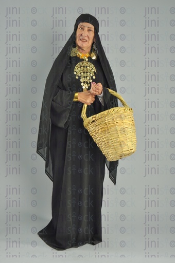 A beautiful upper Egypt woman holding a basket in her hand for putting vegetables or fruits in