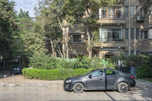 vintage house in Maadi and car parked in front of it