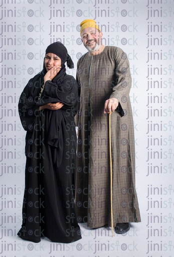 Egyptian farmer father standing next to his daughter