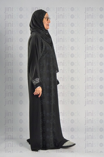 Saudi Arabian or Emirati woman or woman from the Gulf walking