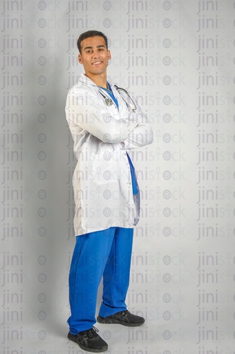 A male Egyptian doctor wearing a white coat and a stethoscope.