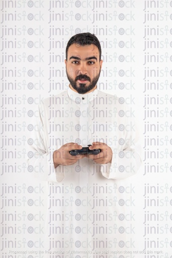 Khaliji or saudi man holding playstation controller