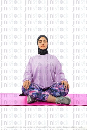 Egyptian girl wearing hijab and doing yoga