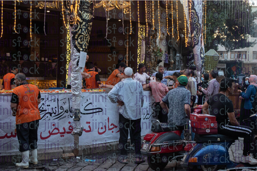 A crowded over ramadan dessert shop - stock image