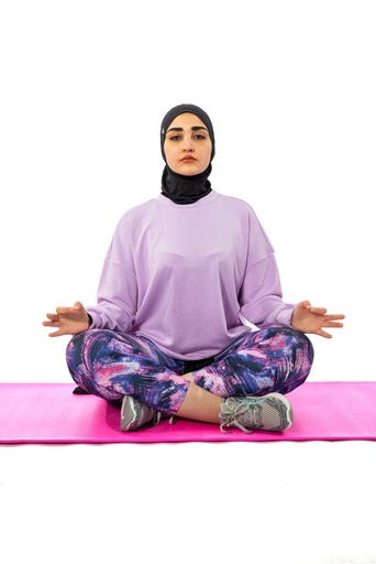 Egyptian girl wearing hijab and doing yoga