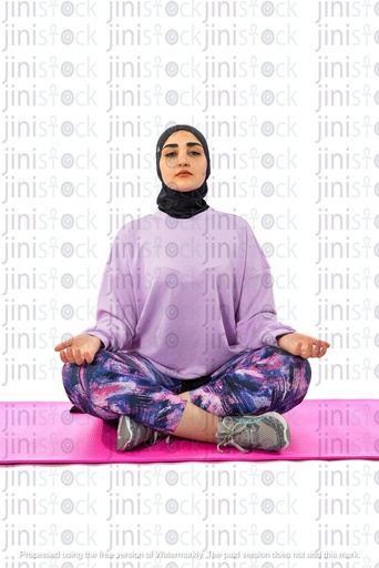 Egyptian girl wearing hijab and doing yoga