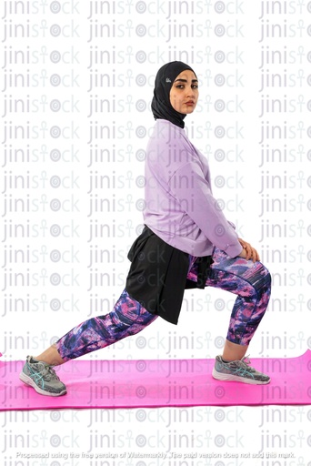 Egyptian woman wearing hijab and exercising 