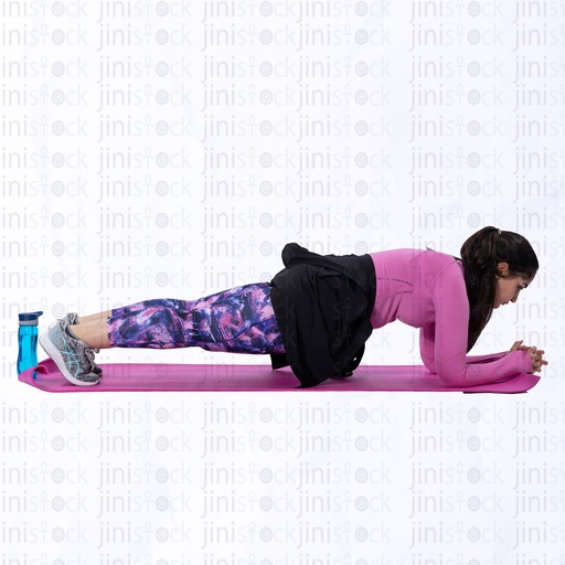 Egyptian Arabic woman doing plank and exercising