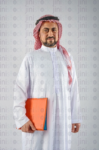 A man from the Gulf Saudi or Emirati man holding a folder of his works papers