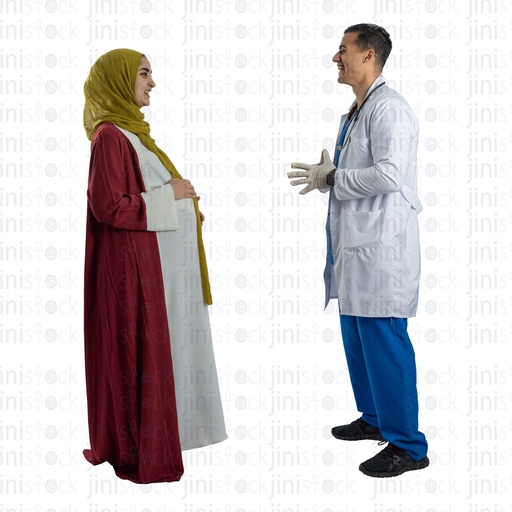 Pregnant woman wearing a hijab standing chatting with her doctor