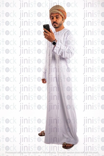 Omani arab khaliji man from gulf checking his mobile