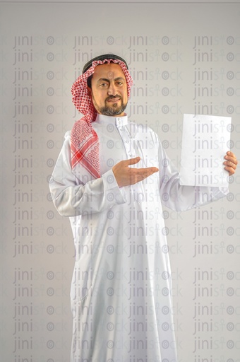 Khaliji man, Saudi, Emirati, or a man from the gulf holding a product. You can modify the image and position the product.