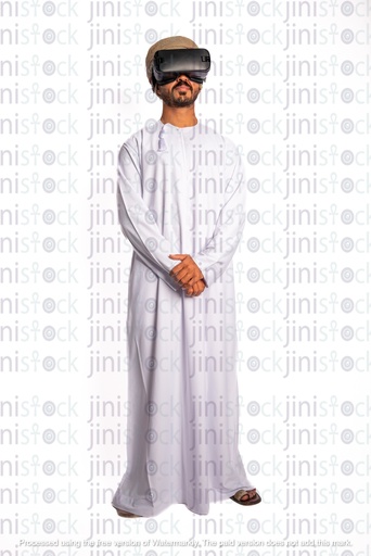 Omani man arab khaliji from gulf wearing VR glasses standing