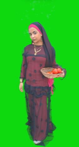 nubian woman farmer holding basket of tomato