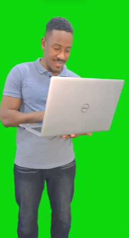 egyptian or sudanese man man working on a laptop