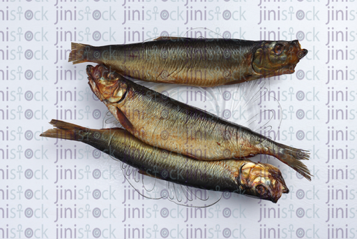 fish on a glass plate - stock image