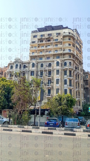 a street in downtown without cars or any means of transportation, and in the picture, and one of the buildings in downtown.