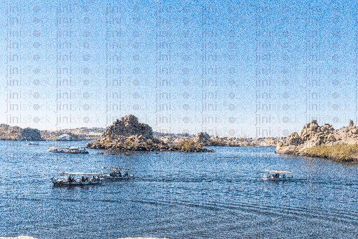 boats sailing around islands in the nile