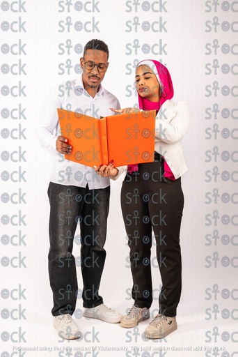A veiled Nubian girl talking to a Nubian young man holding a file
