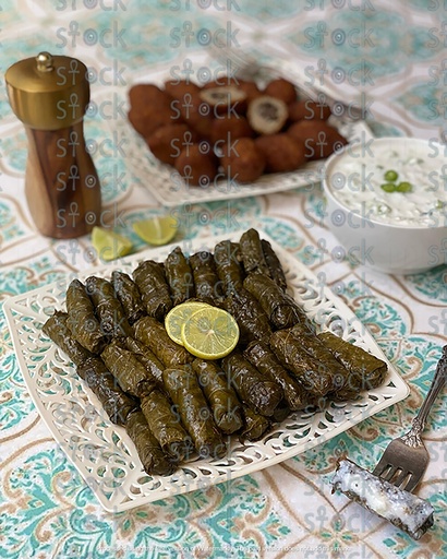 Stuffed grape leaves decorated with lemon slices