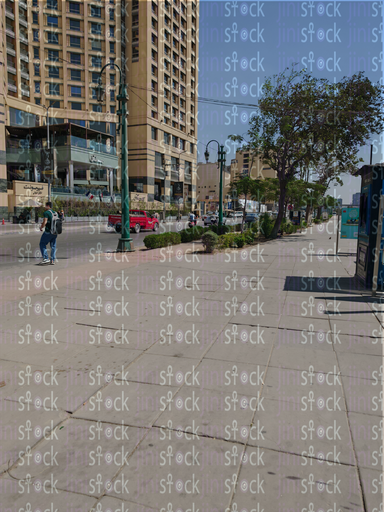 Egypt's promenade sidewalk with trees and shops