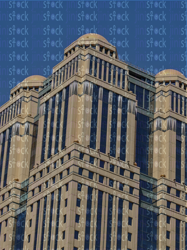 Modern towers embrace the sky above the promenade