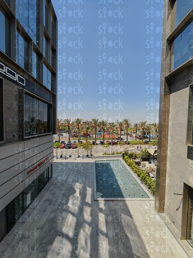 Glass-sided corridor with bench